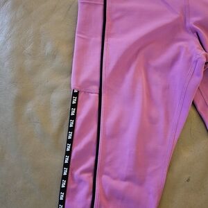 Vibrant Purple Leggings with Black Side Stripe